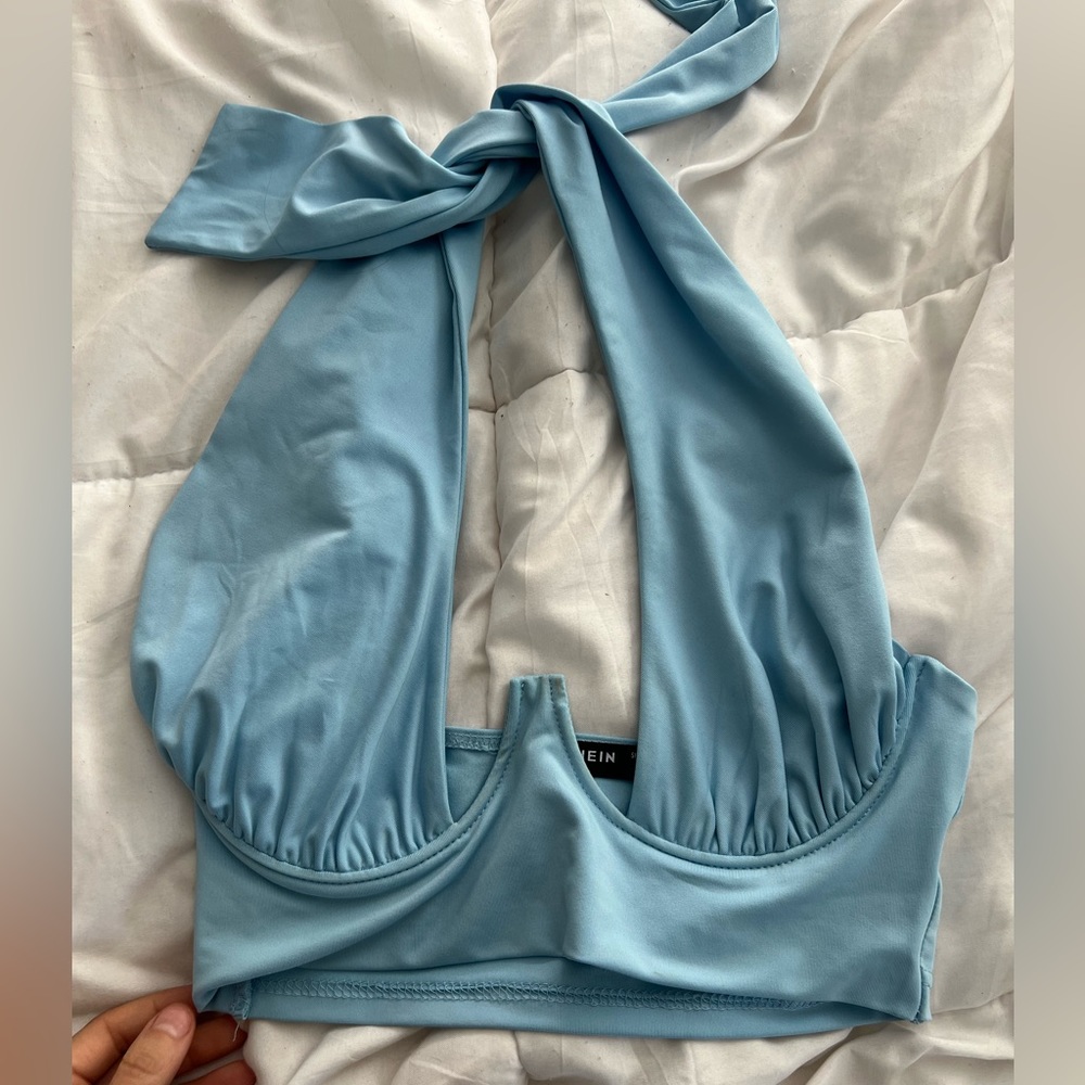 light blue, tie around neck shirt